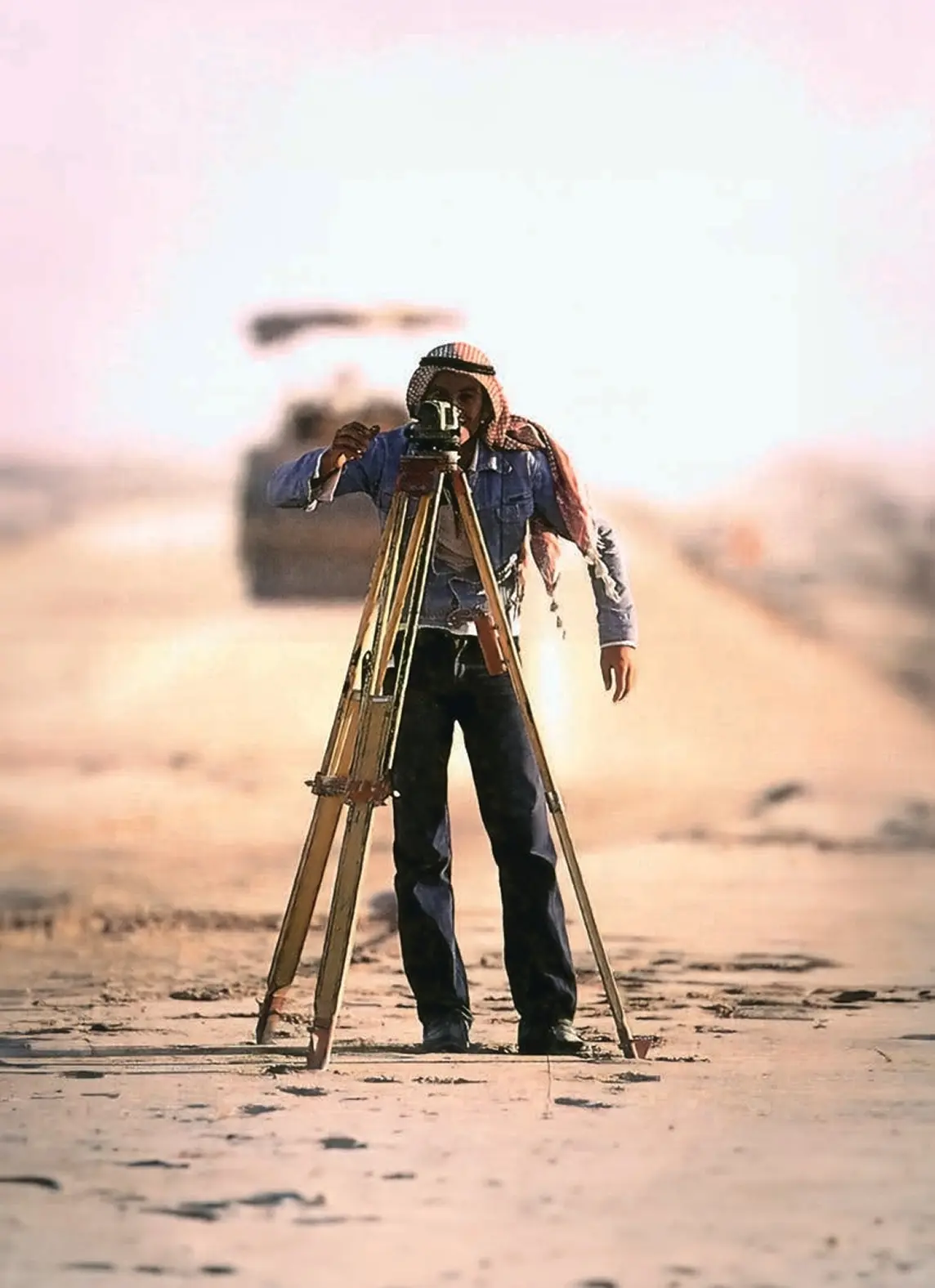 man measuring ground